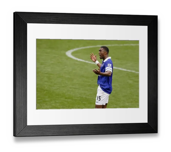 Framed Print : Everton's Glory: Sylvain Distin's Triumphant Celebration After Historic 3-0 Victory Over Arsenal (BPL: Everton vs Arsenal, Goodison Park, 06-04-2014) Framed Print : Everton's Glory: Sylvain Distin's Triumphant Celebration After Historic 3-0 Victory Over Arsenal (BPL: Everton vs Arsenal, Goodison Park, 06-04-2014)