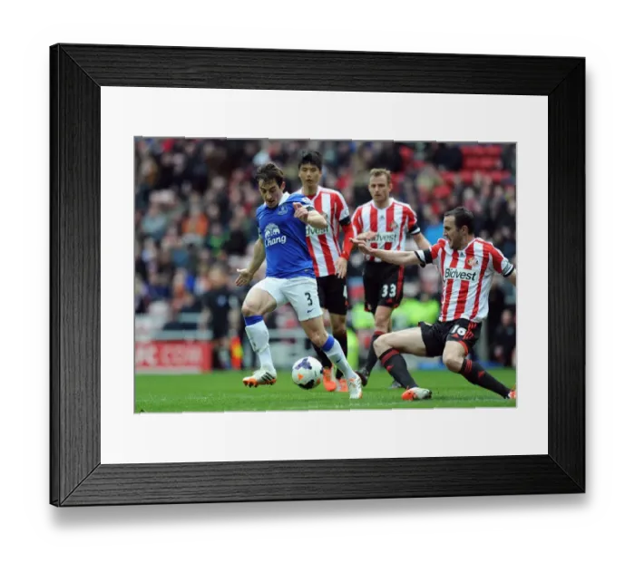 Framed Print : Battle for the Ball: Leighton Baines vs. John O'Shea - Everton's Hard-Fought 1-0 Victory over Sunderland (April 12, 2014) Framed Print : Battle for the Ball: Leighton Baines vs. John O'Shea - Everton's Hard-Fought 1-0 Victory over Sunderland (April 12, 2014)