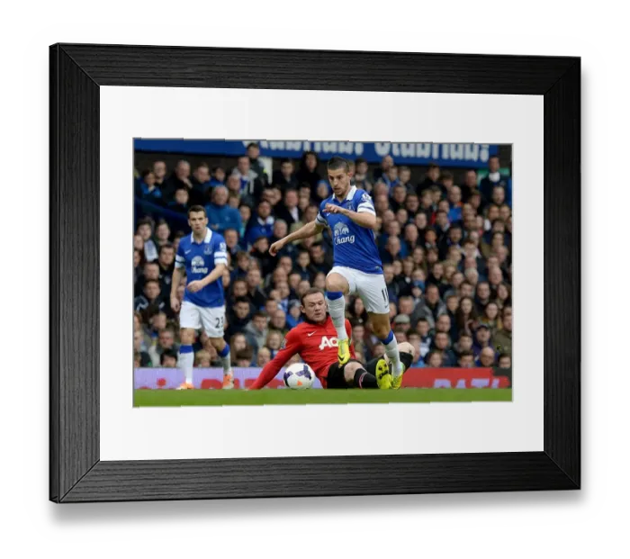 Framed Print : Mirallas Outmaneuvers Rooney: Everton's Triumph Over Manchester United in the Premier League (April 21, 2014, Goodison Park) Framed Print : Mirallas Outmaneuvers Rooney: Everton's Triumph Over Manchester United in the Premier League (April 21, 2014, Goodison Park)