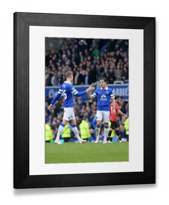Framed Print : Everton's Glory: John Stones and Leighton Baines Celebrate Historic 2-0 Victory Over Manchester United at Goodison Park (Barclays Premier League, 21-04-2014)