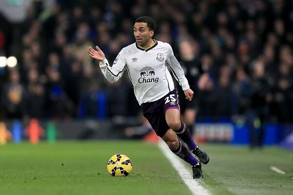 Aaron Lennon Charges Forward in Premier League Clash at Stamford Bridge