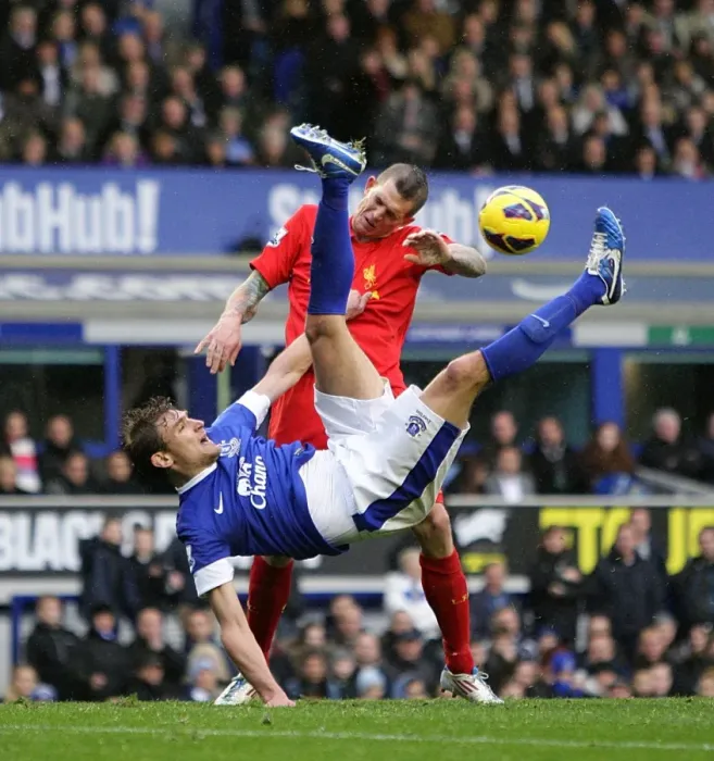 Framed Print : Aerial Clash: Jelavic vs. Agger at Goodison Park (Everton vs. Liverpool, 28-10-2012) Framed Print : Aerial Clash: Jelavic vs. Agger at Goodison Park (Everton vs. Liverpool, 28-10-2012)
