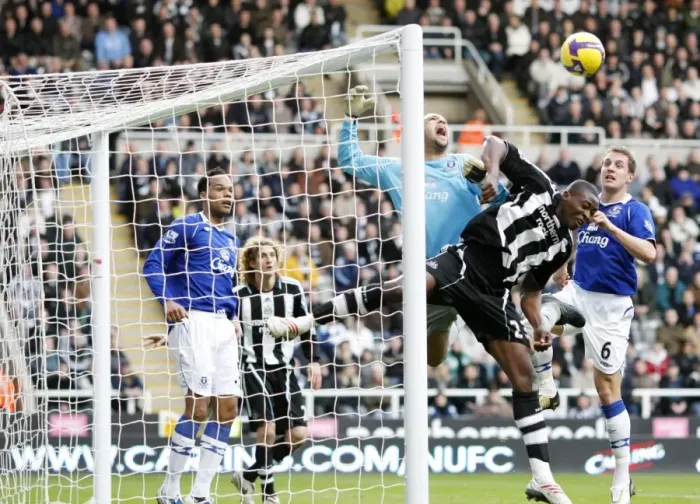 Framed Print : Ameobi vs. Howard: Battle at St. James Park - Everton's Tim Howard Clashes with Newcastle's Shola Ameobi in Premier League Match (08 / 09) Framed Print : Ameobi vs. Howard: Battle at St. James Park - Everton's Tim Howard Clashes with Newcastle's Shola Ameobi in Premier League Match (08 / 09)