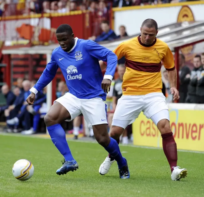 Framed Print : Anichebe Strikes: Everton's Victor Scores Past Michael Higdon at Fir Park Framed Print : Anichebe Strikes: Everton's Victor Scores Past Michael Higdon at Fir Park