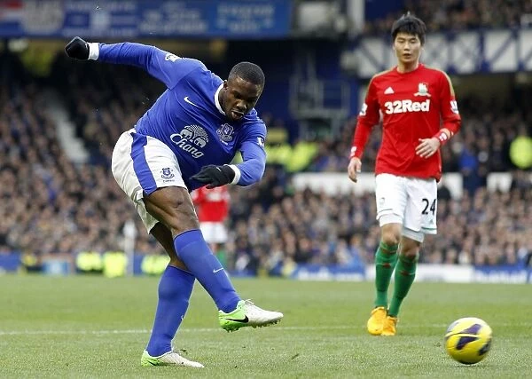 Anichebe's Determined Shot: Everton vs Swansea City, Barclays Premier League, Goodison Park (12-01-2013)