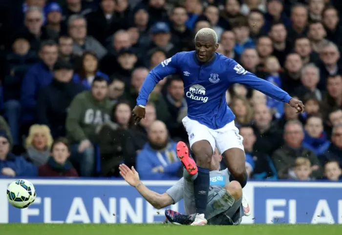 Framed Print : Arouna Kone vs Ryan Taylor: Intense Clash between Everton and Newcastle United in Barclays Premier League at Goodison Park