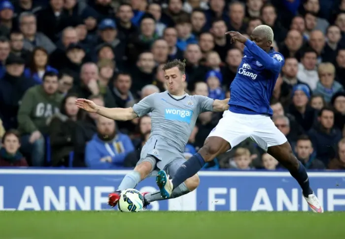 Framed Print : Arouna Kone vs Ryan Taylor: Intense Clash at Goodison Park - Barclays Premier League Framed Print : Arouna Kone vs Ryan Taylor: Intense Clash at Goodison Park - Barclays Premier League