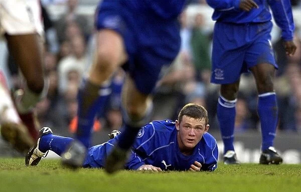 Arsenal v Everton. Evertons Wayne Rooney is floored during the Barclaycard