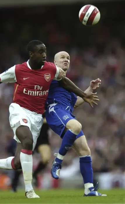 Framed Print : Arsenal v Everton Arsenals Johan Djourou and Evertons Andy Johnson challenge for the ball Framed Print : Arsenal v Everton Arsenals Johan Djourou and Evertons Andy Johnson challenge for the ball