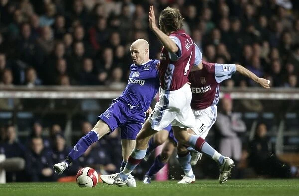 Aston Villa v Everton Andy Johnson in action against Olof Mellberg