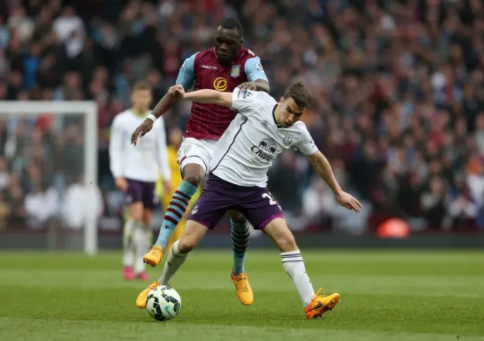Framed Print : Battle for the Ball: Benteke vs. Coleman - Aston Villa vs. Everton, Premier League