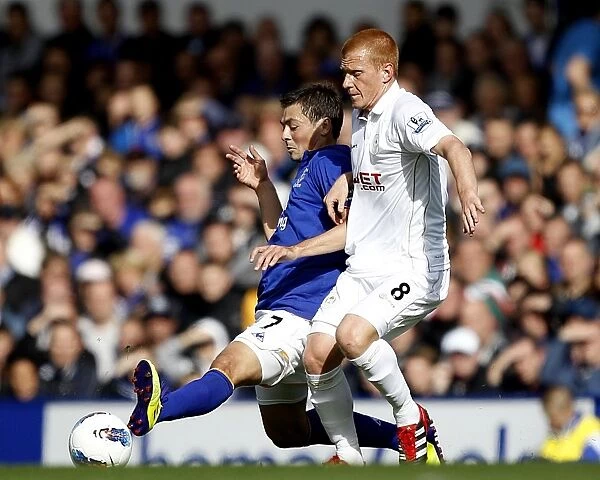 Battle for the Ball: Bilyaletdinov vs. Watson at Goodison Park - Everton vs. Wigan Athletic, Barclays Premier League (September 17, 2011)