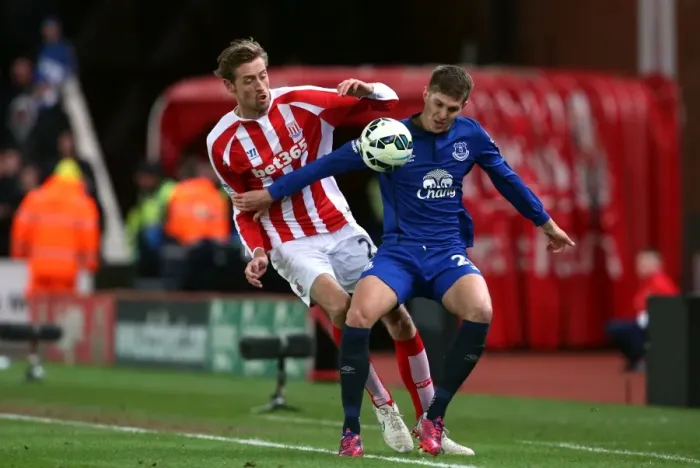 Framed Print : Battle for the Ball: Crouch vs. Stones - Everton vs. Stoke City, Premier League Framed Print : Battle for the Ball: Crouch vs. Stones - Everton vs. Stoke City, Premier League