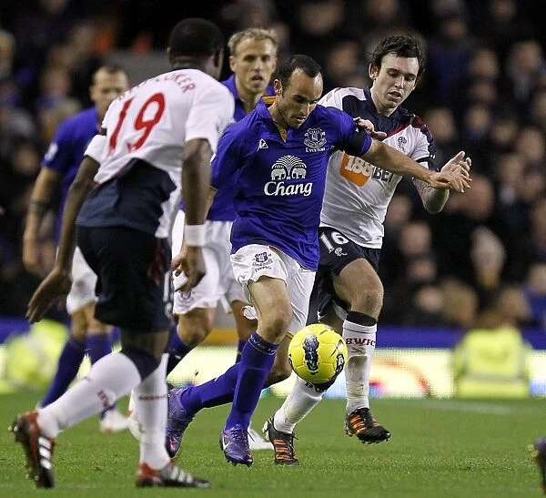 A Battle for the Ball: Donovan vs. Davies at Goodison Park (Everton vs. Bolton Wanderers, BPL, 04 January 2012)