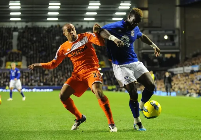 Framed Print : Battle for the Ball: Everton's Intense Tussle with Swansea City's Ashley Richards and Louis Saha Framed Print : Battle for the Ball: Everton's Intense Tussle with Swansea City's Ashley Richards and Louis Saha
