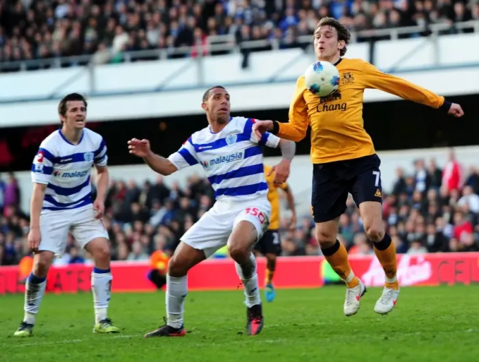 Framed Print : Battle for the Ball: Ferdinand vs. Jelavic - Everton vs. Queens Park Rangers, Premier League Clash (03 March 2012) Framed Print : Battle for the Ball: Ferdinand vs. Jelavic - Everton vs. Queens Park Rangers, Premier League Clash (03 March 2012)