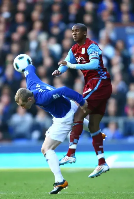 Framed Print : Battle for the Ball: Hibbert vs. Young at Goodison Park - Everton vs. Aston Villa, Premier League (2011)
