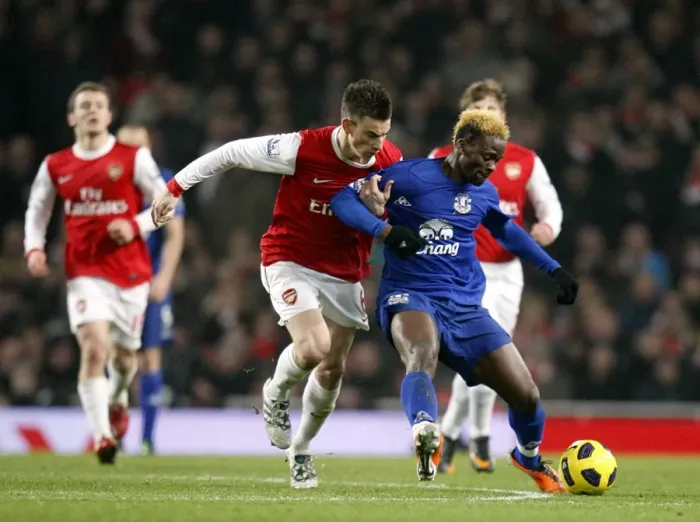Framed Print : Battle for the Ball: Koscielny vs. Saha - Arsenal vs. Everton, Premier League Rivalry (February 2011) Framed Print : Battle for the Ball: Koscielny vs. Saha - Arsenal vs. Everton, Premier League Rivalry (February 2011)