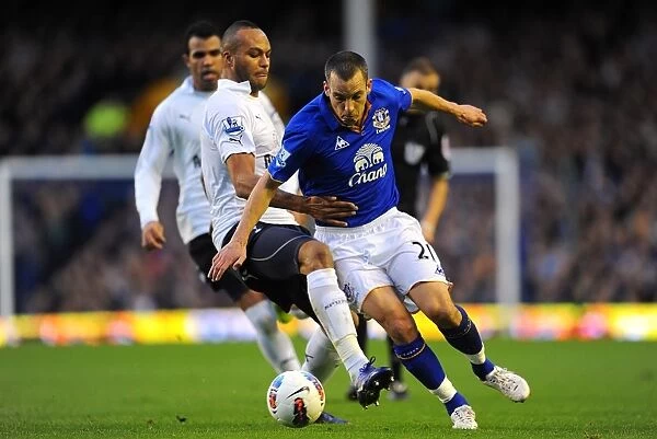 Battle for the Ball: Osman vs. Kaboul - Everton vs. Tottenham Premier League Clash (10 March 2012, Goodison Park)