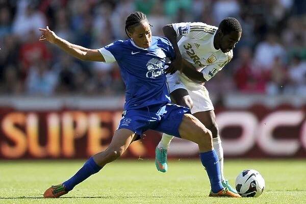 Battle for the Ball: Pienaar's Triumph over Dyer - Everton's Dominance over Swansea City (3-0, September 22, 2012)