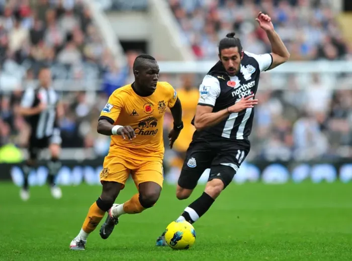 Framed Print : Battle for the Ball: Royston Drenthe vs. Jonas Gutierrez - Premier League Clash (November 2011)