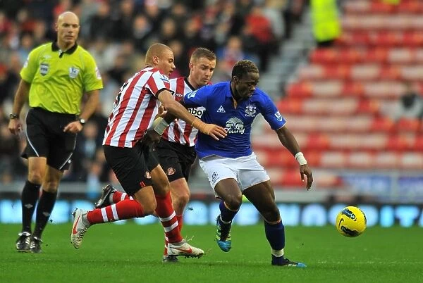 Battle for the Ball: Saha vs. Brown - Everton vs. Sunderland Rivalry in the Premier League (December 2011)