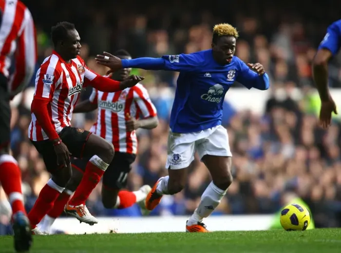 Framed Print : Battle for the Ball: Saha vs Mensah - Everton vs Sunderland's Intense Rivalry (Barclays Premier League, 26 February 2011) Framed Print : Battle for the Ball: Saha vs Mensah - Everton vs Sunderland's Intense Rivalry (Barclays Premier League, 26 February 2011)