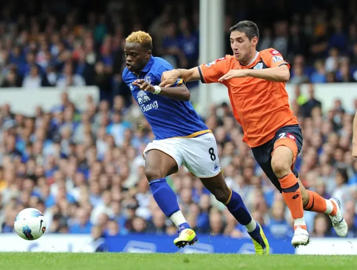 Framed Print : Battle for the Ball: Saha vs. Orr - Everton vs. Queens Park Rangers, Premier League (2011)
