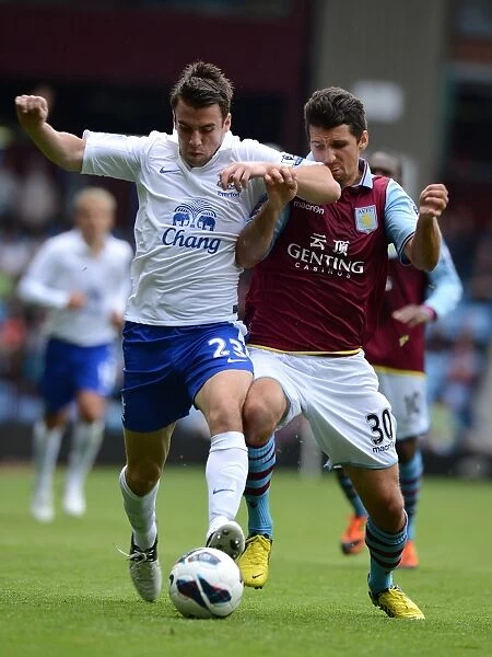 Battle for the Ball: Seamus Coleman vs Eric Lichaj in Everton's Triumph over Aston Villa (BPL 2012-13)