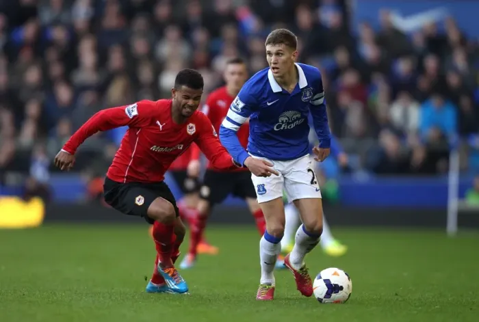 Framed Print : Battle for the Ball: Stones vs. Campbell - Everton's Narrow Victory over Cardiff City (15-03-2014)