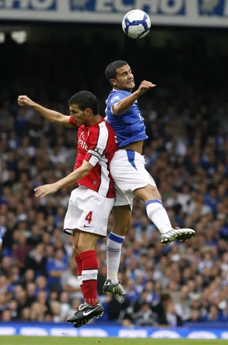 Framed Print : Battle for the Ball: Tim Cahill vs. Francesc Fabregas - Everton vs. Arsenal, Premier League