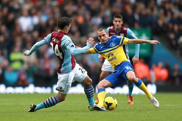 Battle for the Ball: Tonev vs. Osman in Aston Villa vs. Everton's Intense Premier League Clash at Villa Park (26-10-2013)