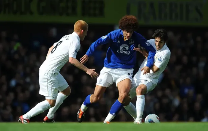Framed Print : Battle at Goodison Park: Fellaini Caught in the Middle - Wigan's Watson and Jordi Gomez Pressure Everton's Marouane Fellaini (17 September 2011: Everton vs Wigan Athletic) Framed Print : Battle at Goodison Park: Fellaini Caught in the Middle - Wigan's Watson and Jordi Gomez Pressure Everton's Marouane Fellaini (17 September 2011: Everton vs Wigan Athletic)