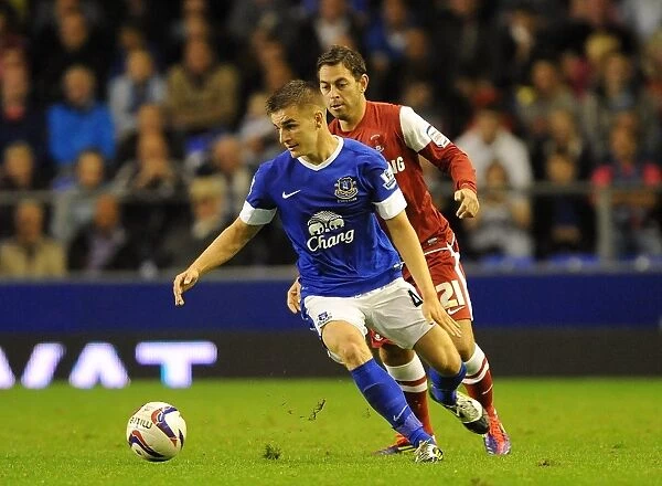 Battle at Goodison Park: Luke Garbutt vs Lee Cook - Everton's Dominant 5-0 Victory over Leyton Orient (Capital One Cup, 2012)