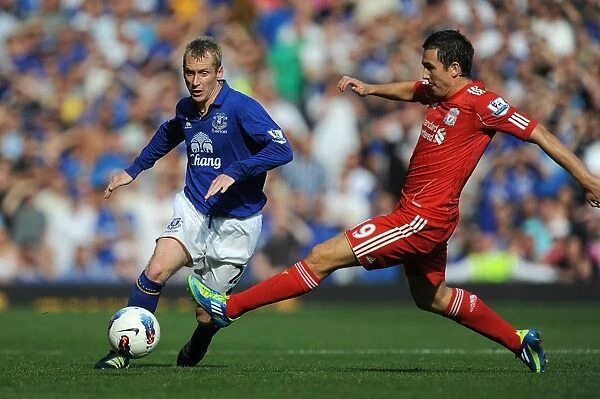 Battle at Goodison Park: Stewart Downing vs. Tony Hibbert - Everton vs. Liverpool, Premier League (2011): A Clash of Determination