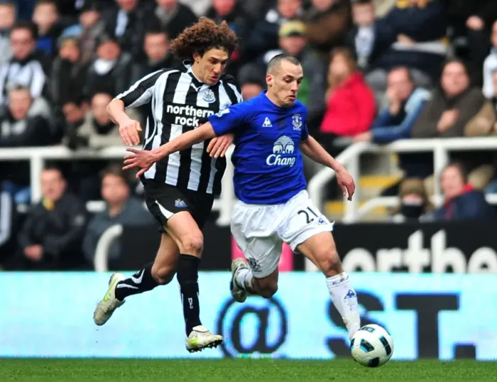 Framed Print : Battle for Supremacy: Osman vs. Coloccini - Everton vs. Newcastle United, Premier League (05 March 2011)