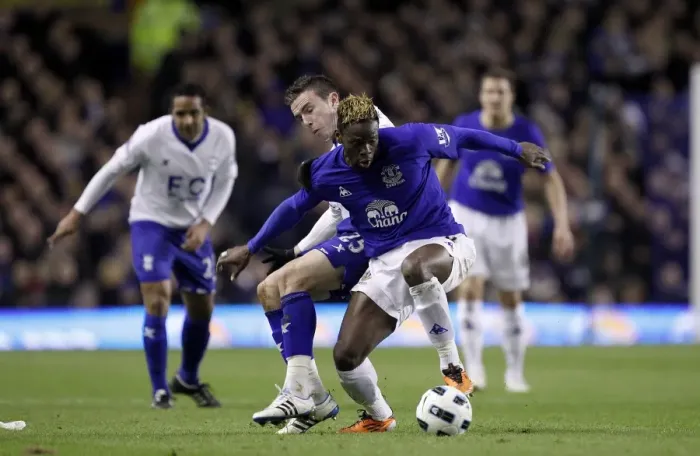 Framed Print : A Battle for Supremacy: Saha vs Mutch at Goodison Park - Everton vs Birmingham City (BPL 2011) Framed Print : A Battle for Supremacy: Saha vs Mutch at Goodison Park - Everton vs Birmingham City (BPL 2011)