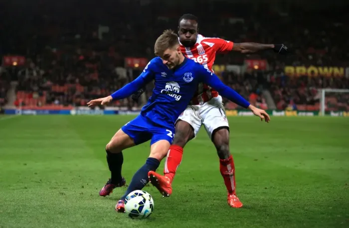 Framed Print : Battling for Control: Moses vs. Garbutt in Stoke City vs. Everton Premier League Clash Framed Print : Battling for Control: Moses vs. Garbutt in Stoke City vs. Everton Premier League Clash
