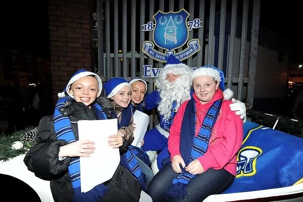 Blue Santa's Magical Visit to Goodison Park: Everton Fans Celebrate the Holidays with Everton FC (December 21, 2011) - Everton vs Swansea City