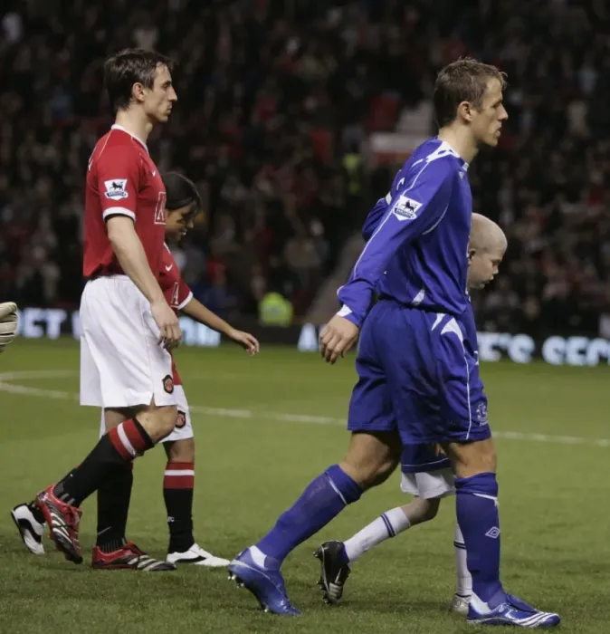 Framed Print : Brothers Neville and Neville lead out Manchester United and Everton