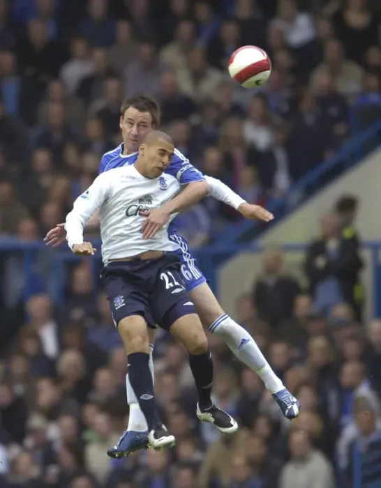 Framed Print : Chelsea v Everton - John Terry and James Vaughan battle for the ball Framed Print : Chelsea v Everton - John Terry and James Vaughan battle for the ball