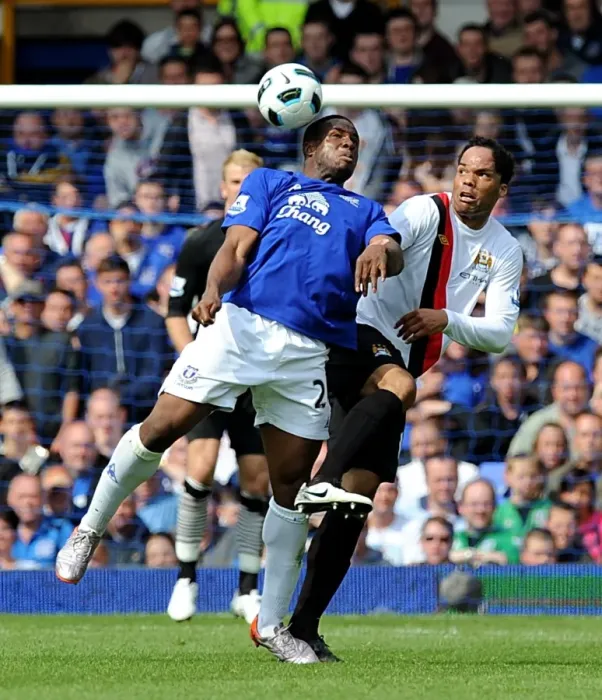 Framed Print : Clash at Goodison Park: Anichebe vs. Lescott - A Premier League Showdown (Everton vs. Manchester City, May 2011)