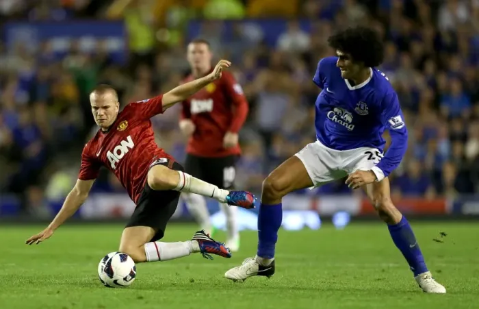 Framed Print : Clash at Goodison Park: Fellaini vs. Cleverley - Everton vs. Manchester United, Premier League Rivalry (August 2012) Framed Print : Clash at Goodison Park: Fellaini vs. Cleverley - Everton vs. Manchester United, Premier League Rivalry (August 2012)