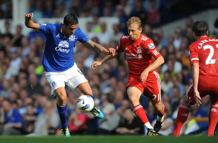 Framed Print : Clash at Goodison Park: Leiva vs. Cahill - Everton vs. Liverpool, Barclays Premier League (2011) - Intense Rivalry on the Field Framed Print : Clash at Goodison Park: Leiva vs. Cahill - Everton vs. Liverpool, Barclays Premier League (2011) - Intense Rivalry on the Field