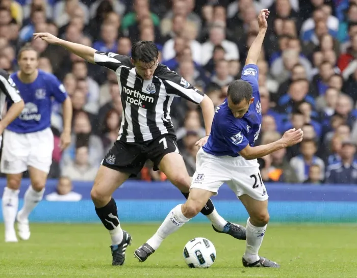 Framed Print : Clash at Goodison Park: Leon Osman vs. Joey Barton - Everton vs. Newcastle United (18 September 2010) Framed Print : Clash at Goodison Park: Leon Osman vs. Joey Barton - Everton vs. Newcastle United (18 September 2010)