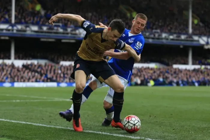 Framed Print : Clash at Goodison Park: McCarthy vs. Koscielny - Everton vs. Arsenal, Premier League: A Battle for the Ball Framed Print : Clash at Goodison Park: McCarthy vs. Koscielny - Everton vs. Arsenal, Premier League: A Battle for the Ball