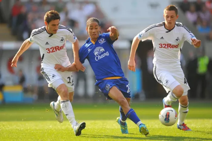 Framed Print : Clash at Liberty: Sigurdsson vs. Pienaar - Everton vs. Swansea City Framed Print : Clash at Liberty: Sigurdsson vs. Pienaar - Everton vs. Swansea City
