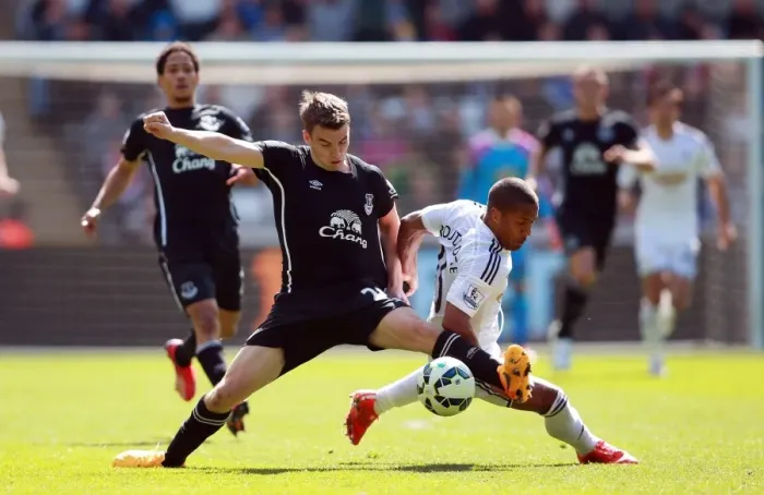 Framed Print : Clash at Liberty: Wayne Routledge vs. Seamus Coleman - Premier League Showdown Framed Print : Clash at Liberty: Wayne Routledge vs. Seamus Coleman - Premier League Showdown
