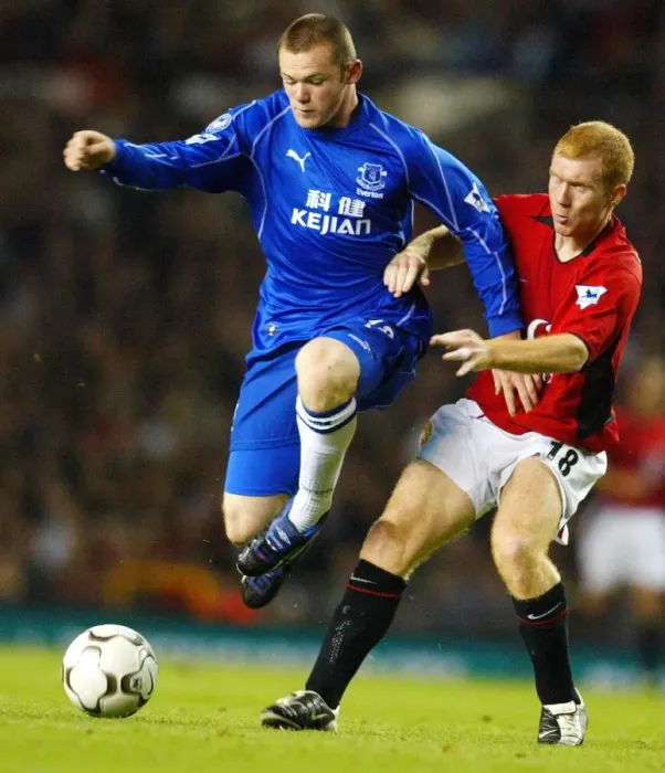 Framed Print : Clash at Old Trafford: Scholes vs Rooney - Manchester United's Iconic Rivalry