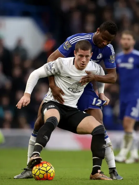 Framed Print : Clash at Stamford Bridge: A Battle for the Ball between Mikel John Obi and Ross Barkley (Premier League Showdown) Framed Print : Clash at Stamford Bridge: A Battle for the Ball between Mikel John Obi and Ross Barkley (Premier League Showdown)